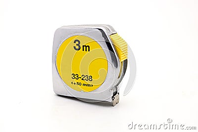 Metal yellow tape measure on white background flexible ruler used to measure distance. Stock Photo