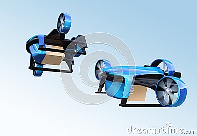 Metallic blue VTOL drones carrying delivery packages flying in the sky Stock Photo