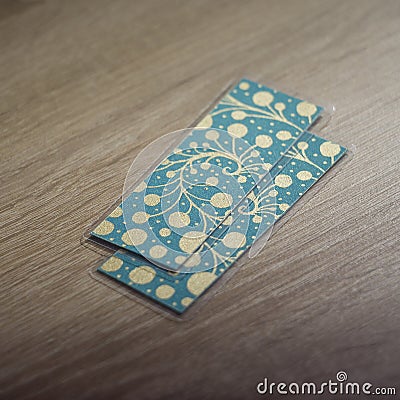 Metallic bookmarks on the table Stock Photo