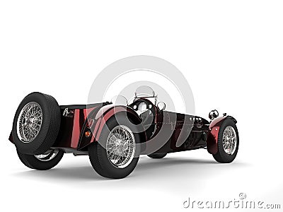 Metallic deep red vintage open wheel sport racing car - back view Stock Photo