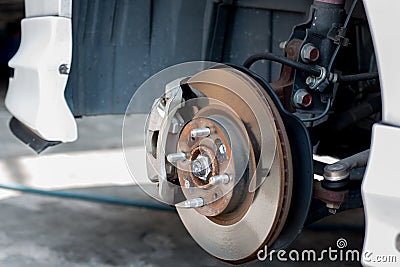 Metallic disks fitted over the centre part of car`s tyres. Stock Photo