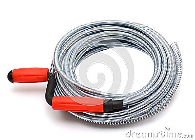 Metallic drain cleaning cable isolated Stock Photo