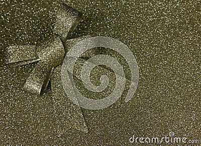 Metallic glittering golden background with a loop Stock Photo