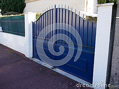 Metallic high door classic portal home iron classical black steel vintage metal steel house gate Stock Photo