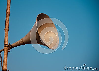 Metallic outdoor loud speakers with sky background photo Stock Photo