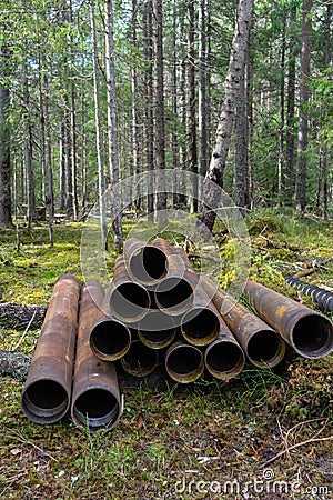 Metallic pipes for fixing the walls of geological wells. Well casing pipes Stock Photo