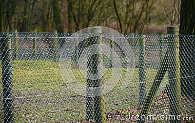 Metallic protection fence around a place Stock Photo