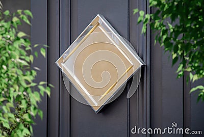 Metallic sign on hotel door mockup. Golden plate on storefront wall in street Stock Photo