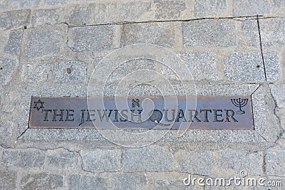 Metallic sign of jewish quarter written in english language outside on the street in multi cultural historical city of Toledo, Stock Photo