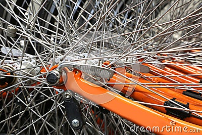 Metallic spokes of many bikes Stock Photo
