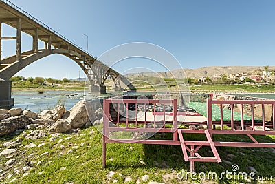 Metallic structure with mats and cushions to have a relaxing time on the banks of the Tigris river and in the shadow Stock Photo