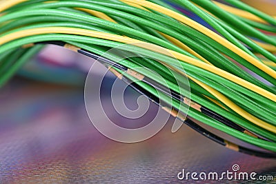 Surface with reflection of green electrical wires Stock Photo