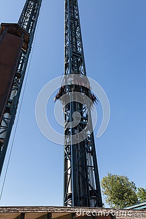 Metallic Tower in the Amusement Park: Crazy Speed Uphill and Downhill Stock Photo