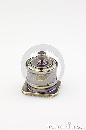 Metallic vintage inkwell Stock Photo