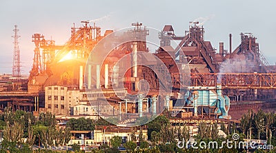 Metallurgical plant at colorful sunset. Industrial landscape. St Stock Photo