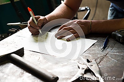 Metalworker working on a project Stock Photo