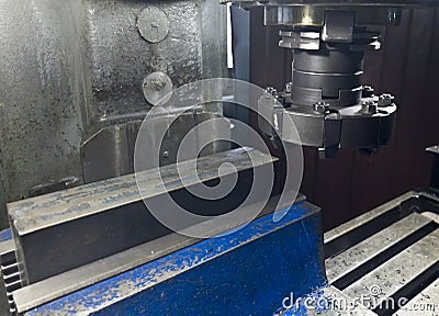 Metalworking. Large high speed milling head and part for machining Stock Photo