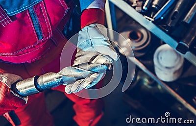 Metalworking Technician with Large Drill Bit in His Hands Stock Photo