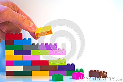 Metaphoric shot of toy brick wall Stock Photo