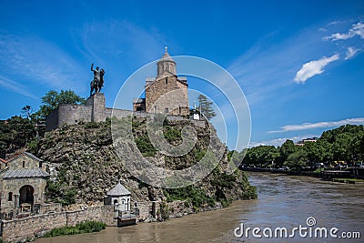 Metekhi church and King Vakhtang Gorgasali in Tbilisi,Georgia Stock Photo