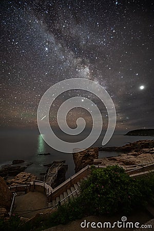 Meteor and Milk way in Acadia National Park in Maine Stock Photo