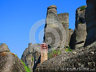 Building chimney and rocks at Meteora Stock Photo