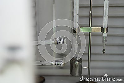 A meteorological thermometer consisting of a maximum and minimum thermometer is placed in a meteorological cage. This tool is used Stock Photo