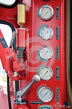 Meters or gauge in crane cabin for measure Maximun load, Engine speed , Hydraulic pressure , Temperature and fuel level Stock Photo