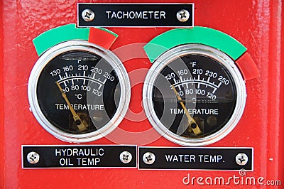 Meters or gauge in crane cabin for measure Maximun load, Engine speed , Hydraulic pressure , Temperature and fuel level Stock Photo