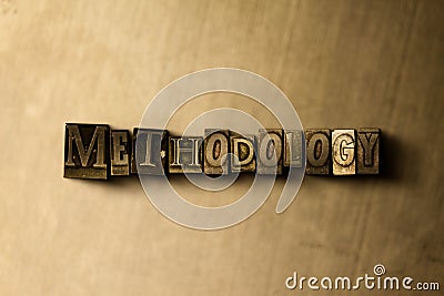 METHODOLOGY - close-up of grungy vintage typeset word on metal backdrop Cartoon Illustration