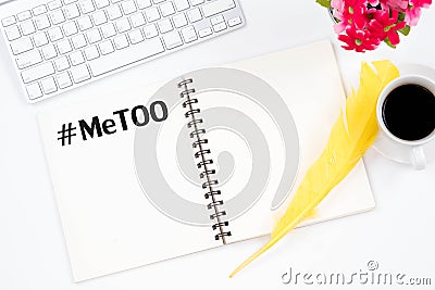 MeToo hashtag on note book and top viwe modern workplace on whit Stock Photo