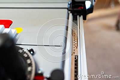 Metric ruler for the cutting fence on professional table saw Stock Photo