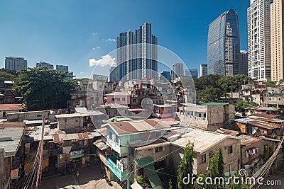 Cityscape of Makati and BGC: slums and skyscrapers contrast Editorial Stock Photo