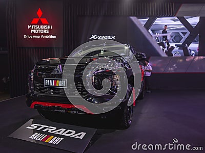 Metro Manila, Philippines - A 2023 Mitsubishi Ralliart Strada pickup truck on display at the Philippine International Editorial Stock Photo