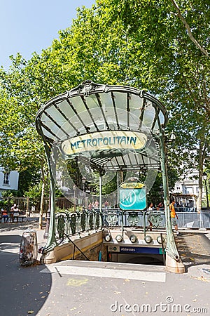 Metro Paris Metropolitain entrance Station Abbesses Art Nouveau portrait format MRT in France Editorial Stock Photo