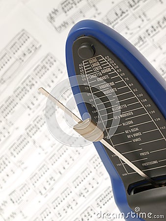 Metronome with Chopin's prelude in the background Stock Photo