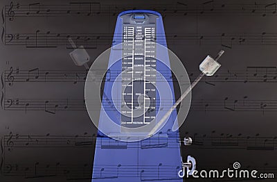 Metronome keeping time Stock Photo