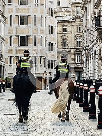 The Metropolitan Police Mounted Branch is a Met Operations branch of London`s Metropolitan Police who operate on horseback. Editorial Stock Photo