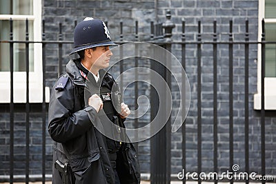 Metropolitan Policewoman on duty in London Editorial Stock Photo