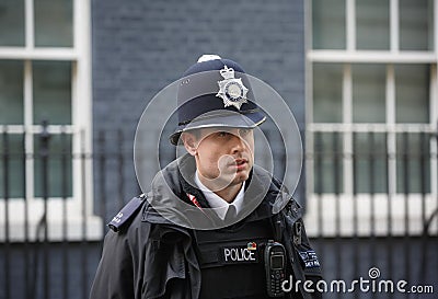 Metropolitan Policewoman on duty in London Editorial Stock Photo