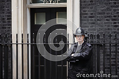 Metropolitan Policewoman on duty in London Editorial Stock Photo