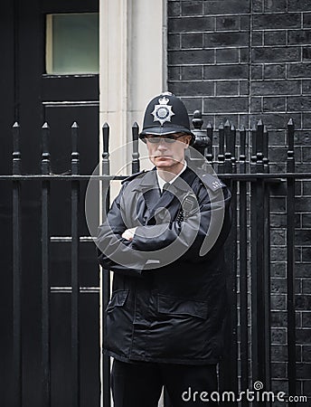 Metropolitan Policewoman on duty in London Editorial Stock Photo