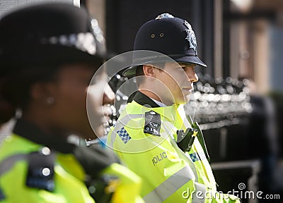 Metropolitan Policewoman on duty in London Editorial Stock Photo