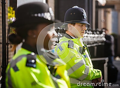 Metropolitan Policewoman on duty in London Editorial Stock Photo