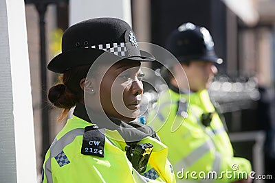 Metropolitan Policewoman on duty in London Editorial Stock Photo