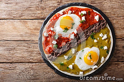 Mexican breakfast: eggs huevos divorciados with beans Frijoles r Stock Photo