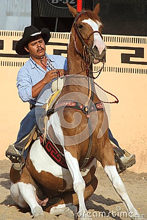 Mexican charros horseman on sitting horse, TX, US Editorial Stock Photo