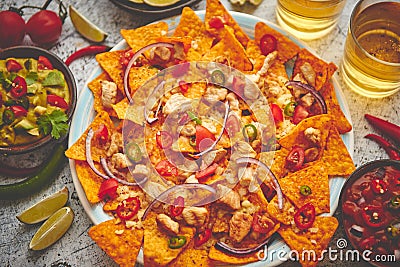 Mexican corn nacho spicy chips served with melted cheese Stock Photo