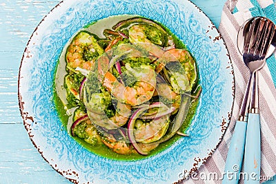 MEXICAN CUISINE. Aguachile de camaron. Prawns aguachile. Shrimps eviche cebiche with cucumber, lemon and purple onion Stock Photo