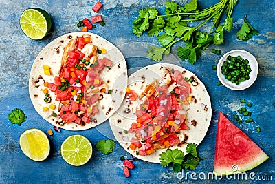 Mexican grilled chicken tacos with watermelon salsa. Stock Photo